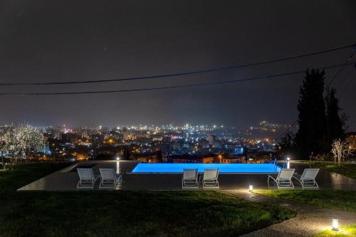 Infinity pool above the lights of Bar